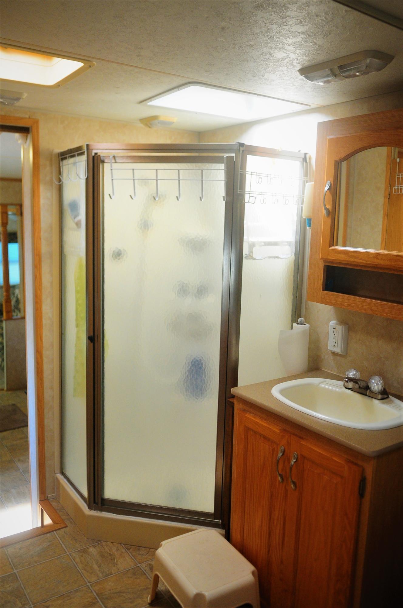 55 Boca Chica Road, Unit 461 Key West, FL 33040 - Photo 19 of 37 a bathroom with a sink a toilet and shower