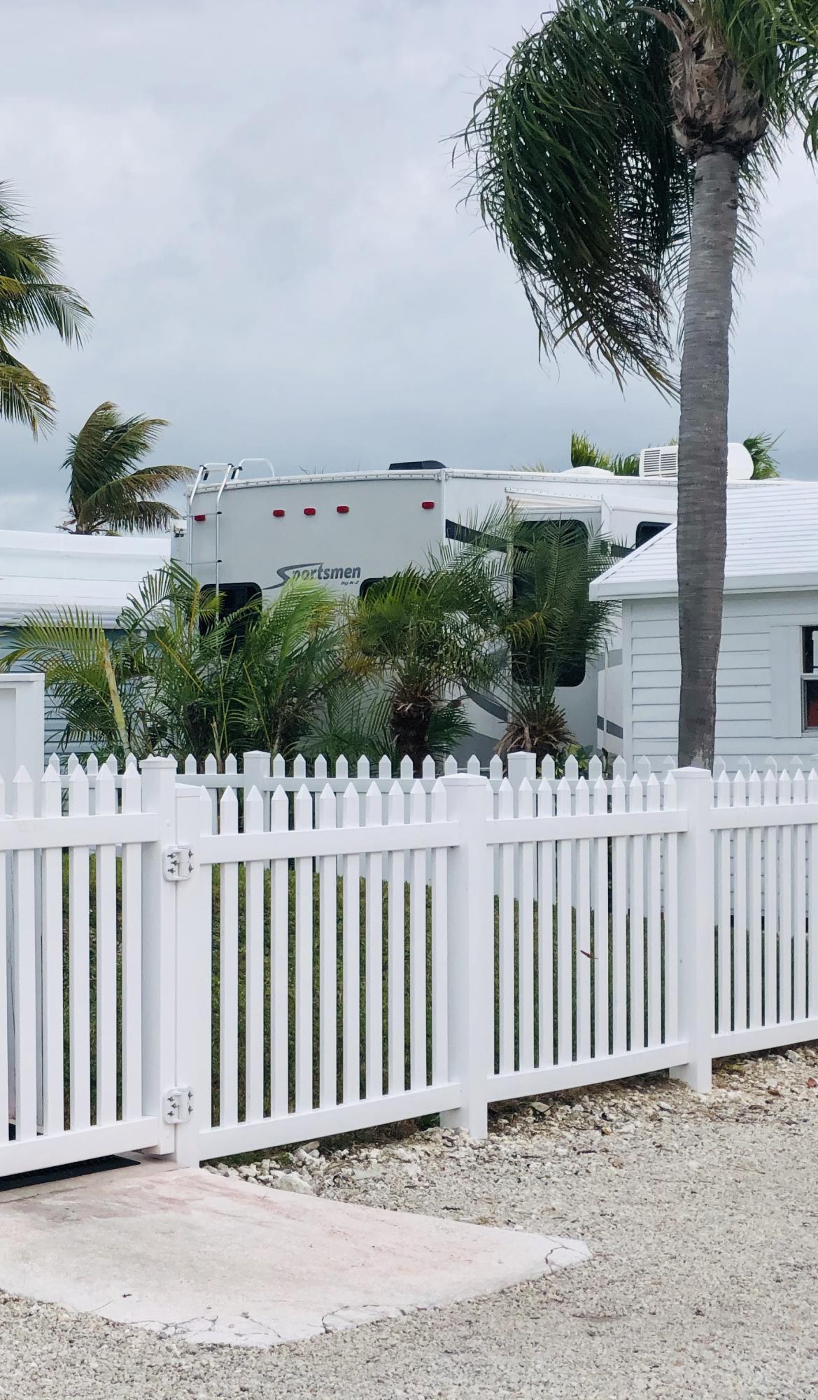 55 Boca Chica Road, Unit 461 Key West, FL 33040 - Photo 25 of 37 a view of a wooden fence