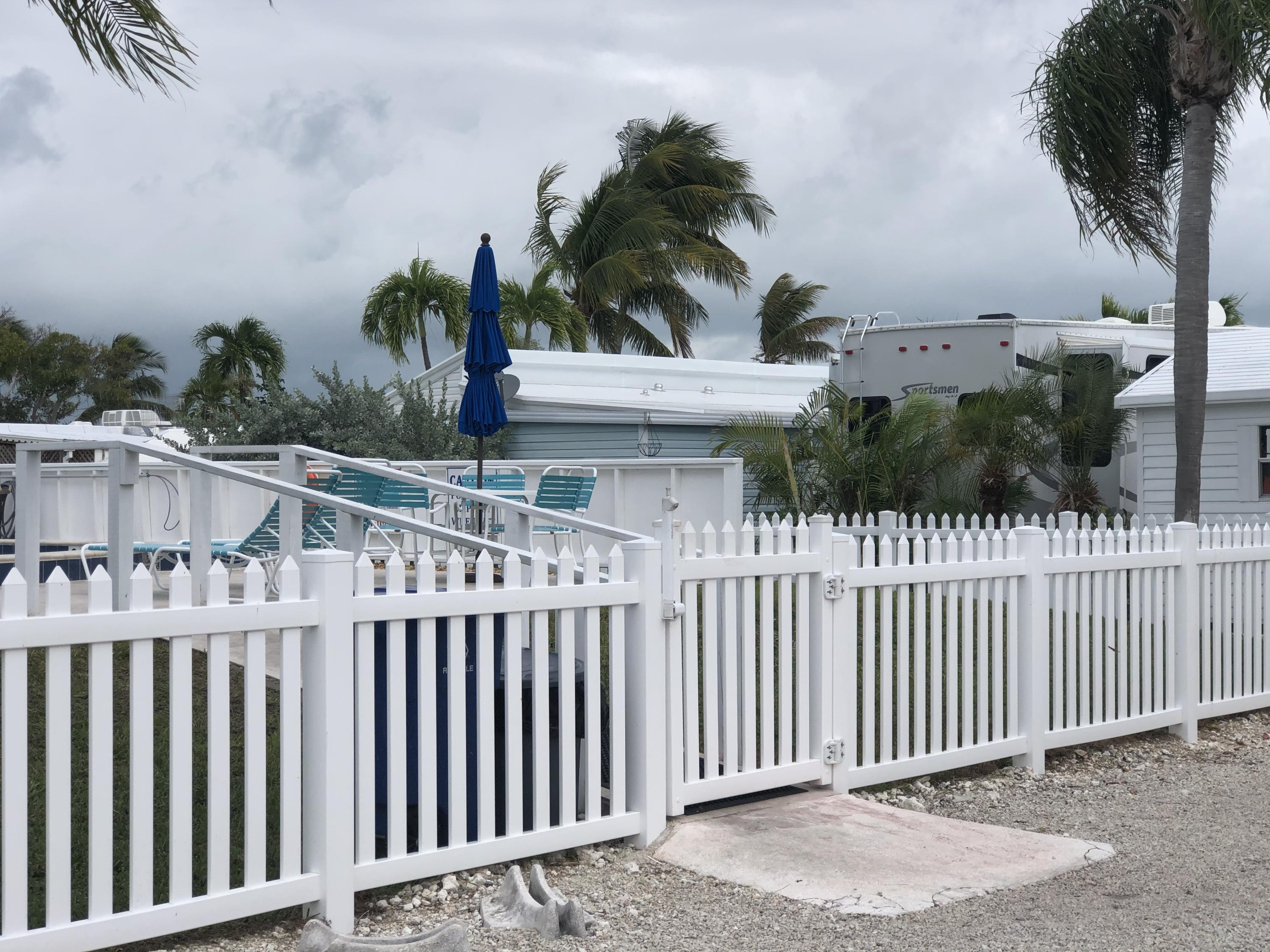 55 Boca Chica Road, Unit 461 Key West, FL 33040 - Photo 27 of 37 a view of a wrought iron fences in front of house