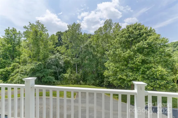 a view of a wooden fence