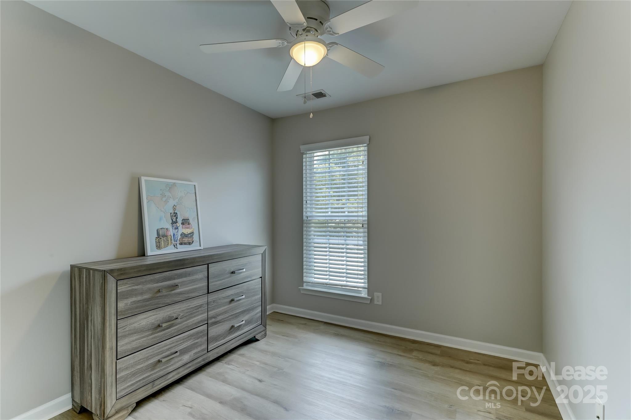 1132 Drayton Court Fort Mill, SC 29708 - Photo 30 of 41 wooden floor in an empty room with a window