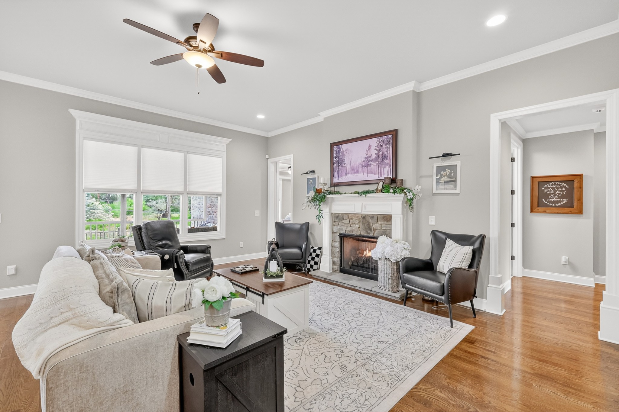 2007 Imagine Circle Spring Hill, TN 37174 - Photo 11 of 44 a living room with furniture a fireplace and a large window