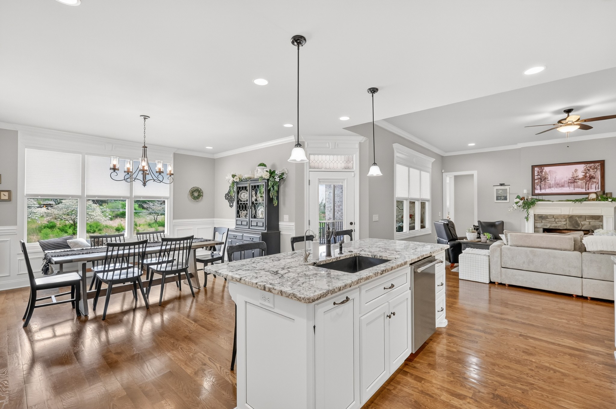 2007 Imagine Circle Spring Hill, TN 37174 - Photo 21 of 44 a large kitchen with kitchen island lots of counter space a sink appliances and a living room view
