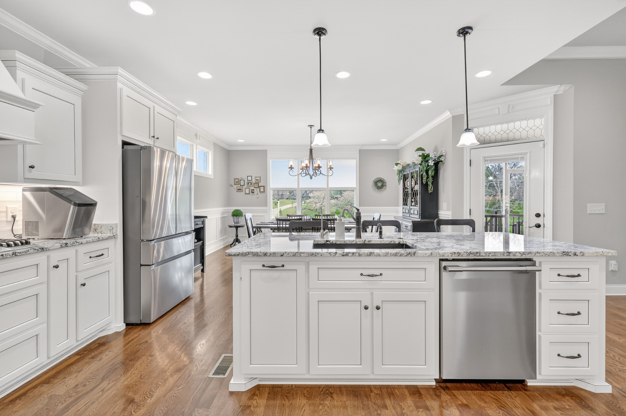 2007 Imagine Circle Spring Hill, TN 37174 - Photo 22 of 44 a kitchen with kitchen island white cabinets and stainless steel appliances