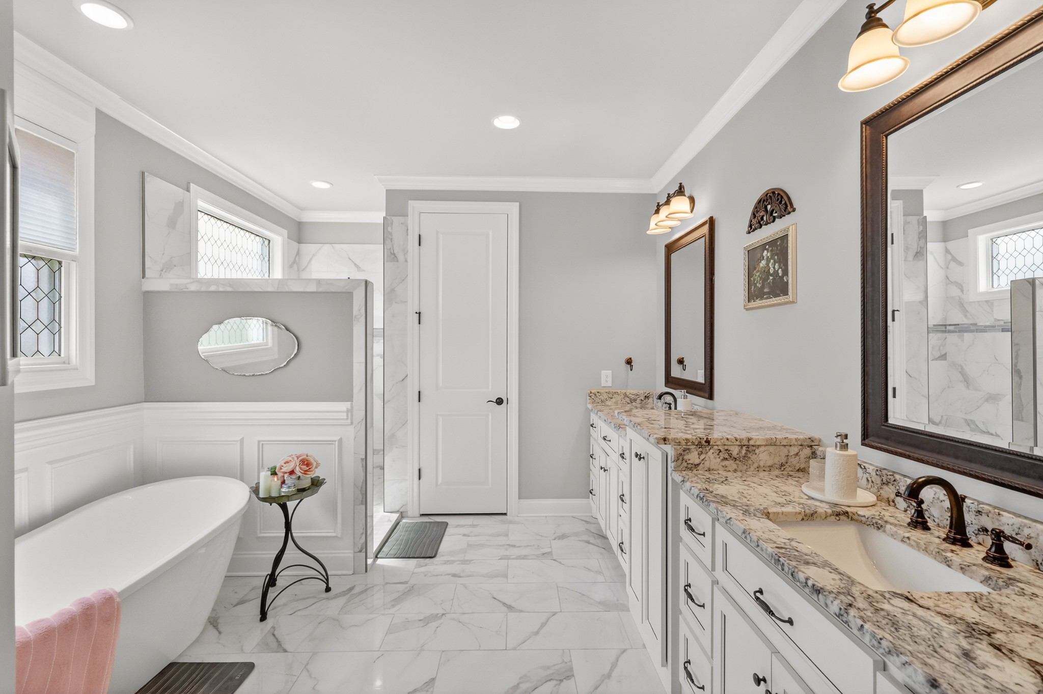2007 Imagine Circle Spring Hill, TN 37174 - Photo 25 of 44 a bathroom with a granite countertop sink mirror and a bathtub