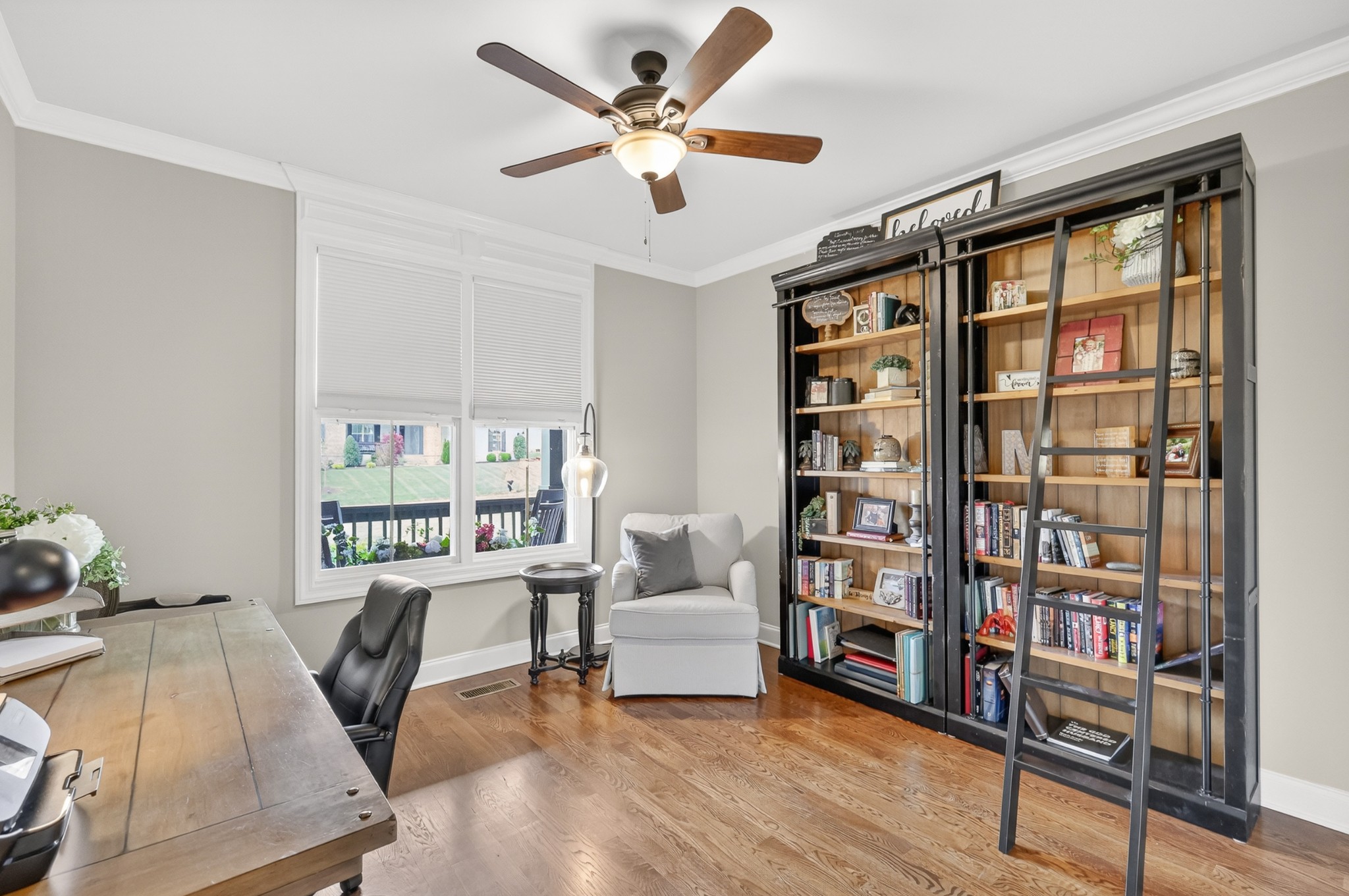 2007 Imagine Circle Spring Hill, TN 37174 - Photo 30 of 44 a living room with couch and book shelf