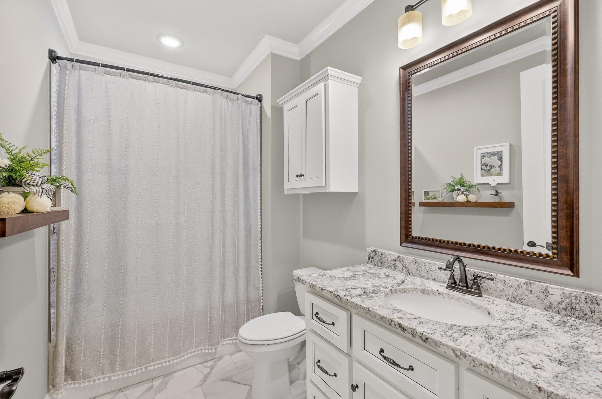 2007 Imagine Circle Spring Hill, TN 37174 - Photo 32 of 44 a bathroom with a granite countertop sink toilet and mirror