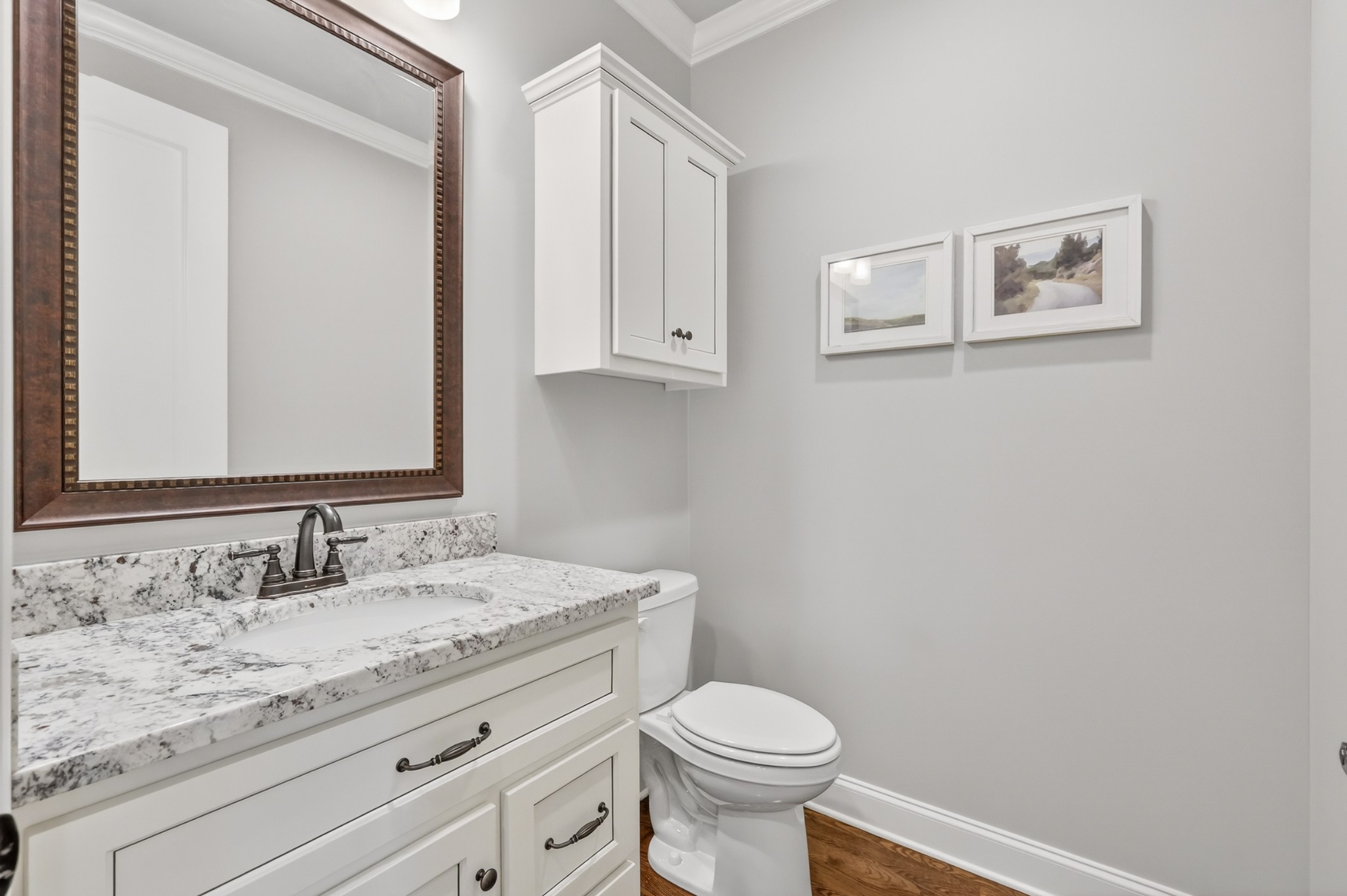 2007 Imagine Circle Spring Hill, TN 37174 - Photo 34 of 44 a bathroom with a granite countertop toilet sink and mirror