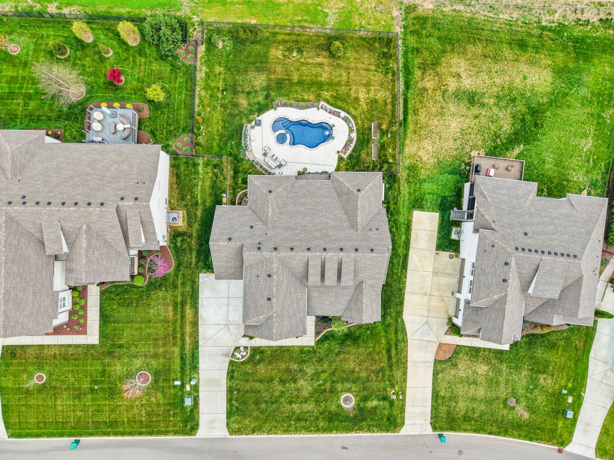 2007 Imagine Circle Spring Hill, TN 37174 - Photo 4 of 44 an aerial view of a house with a yard and large trees