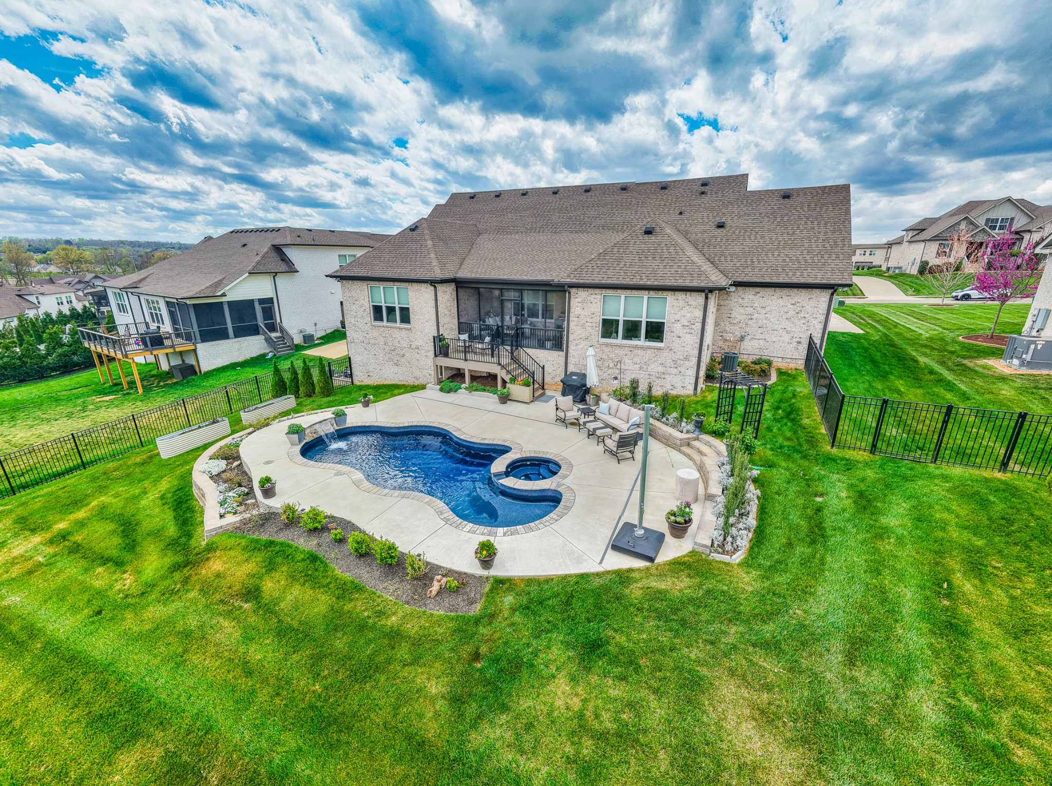 2007 Imagine Circle Spring Hill, TN 37174 - Photo 42 of 44 a view of a house with a backyard porch and sitting area