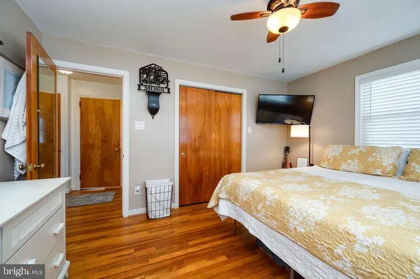 a room with toys and dresser