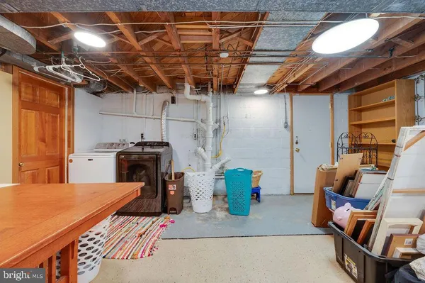 a kitchen with a stove and a refrigerator