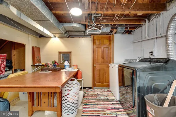 a kitchen with sink cabinets and stove