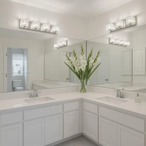 a bathroom with a sink a mirror and a light fixture