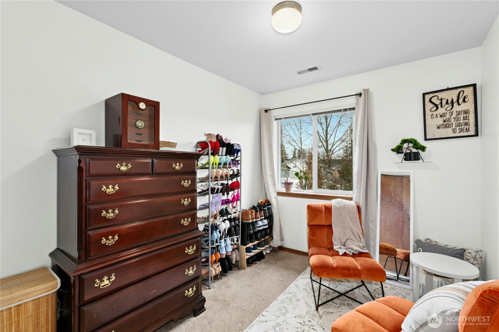 103 Harrison Lane, Unit 14 Orting, WA 98360 - Photo 14 of 17 a view of a livingroom with furniture and a window