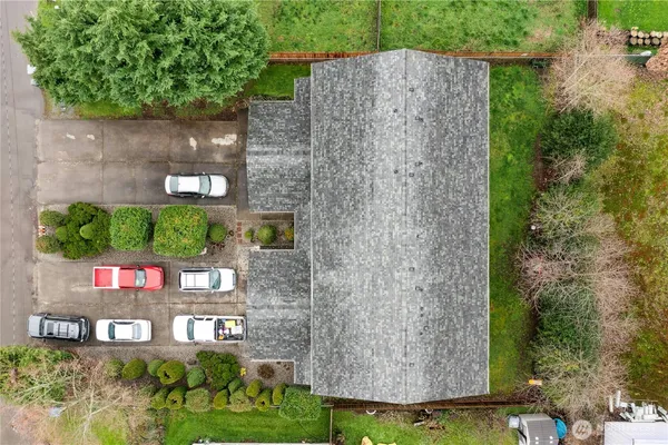 an aerial view of a house with a garden