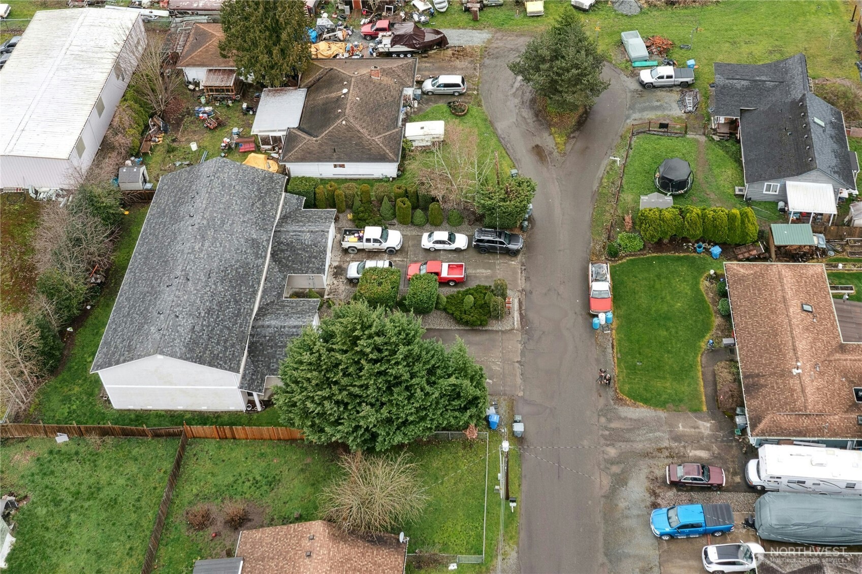103 Harrison Lane, Unit 14 Orting, WA 98360 - Photo 17 of 17 an aerial view of a house with a garden