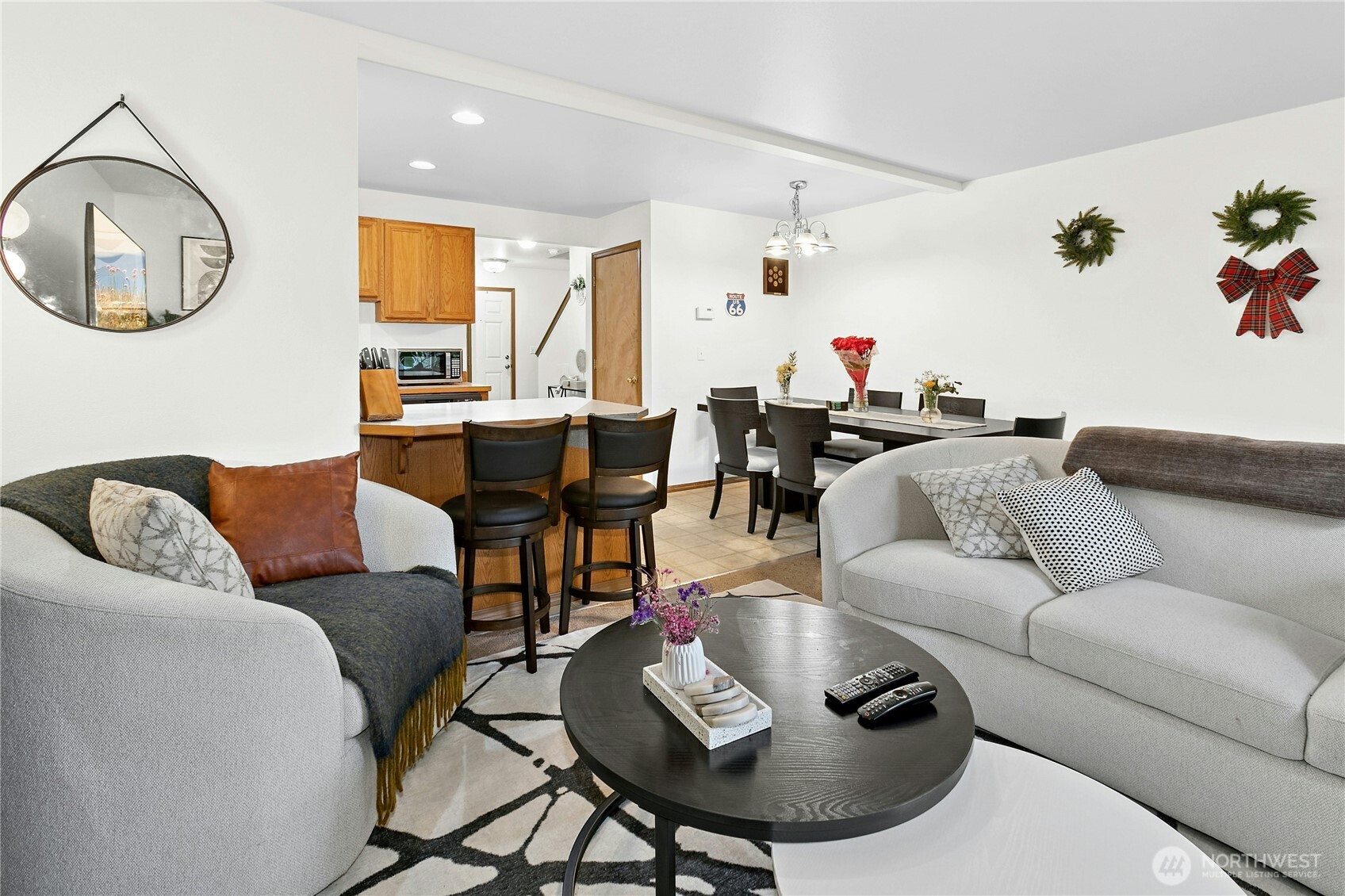 103 Harrison Lane, Unit 14 Orting, WA 98360 - Photo 6 of 17 a living room with furniture and a wooden floor
