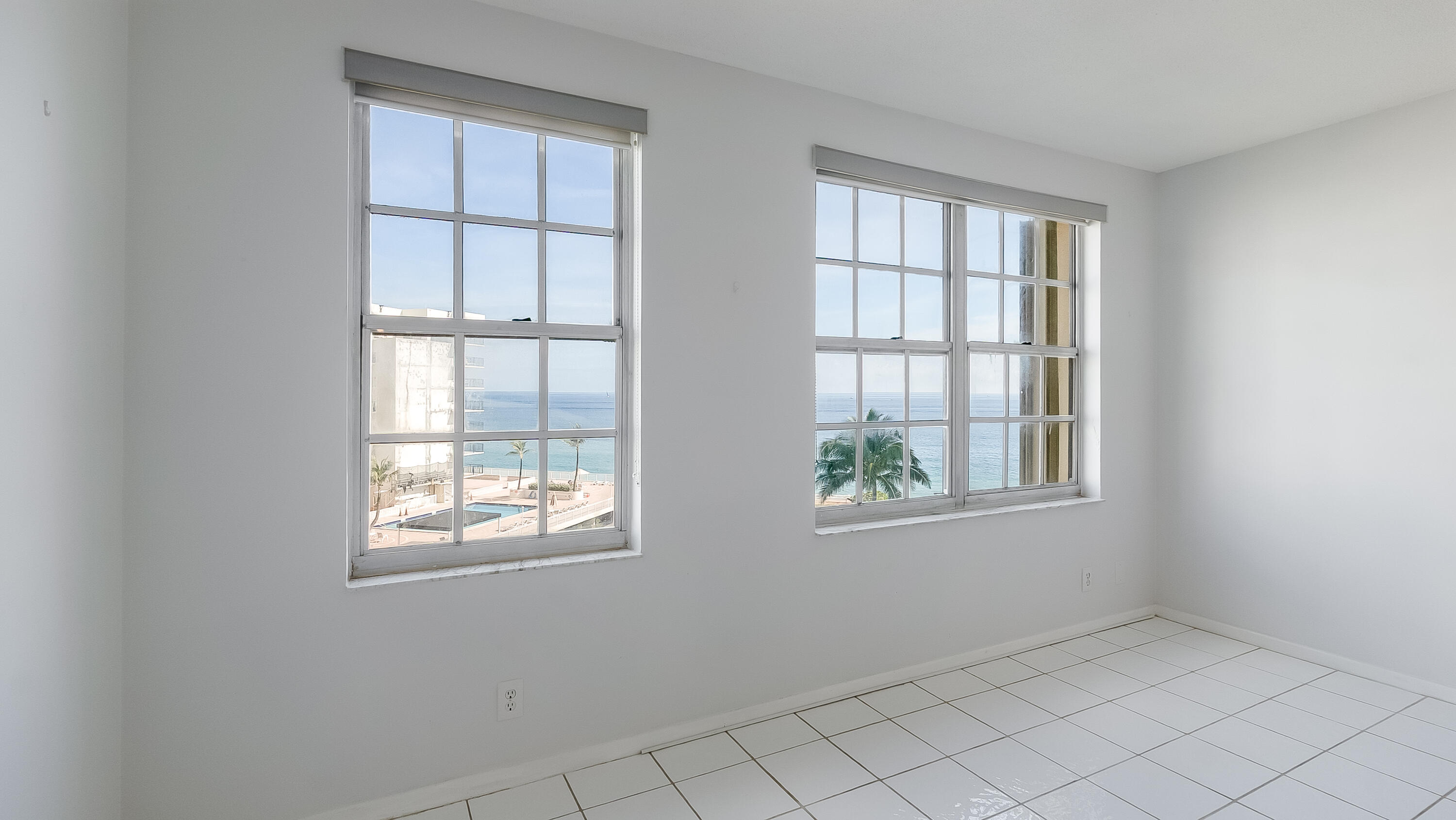 3475 South Ocean Boulevard, Unit 5140 Palm Beach, FL 33480 - Photo 14 of 55 an empty room with windows