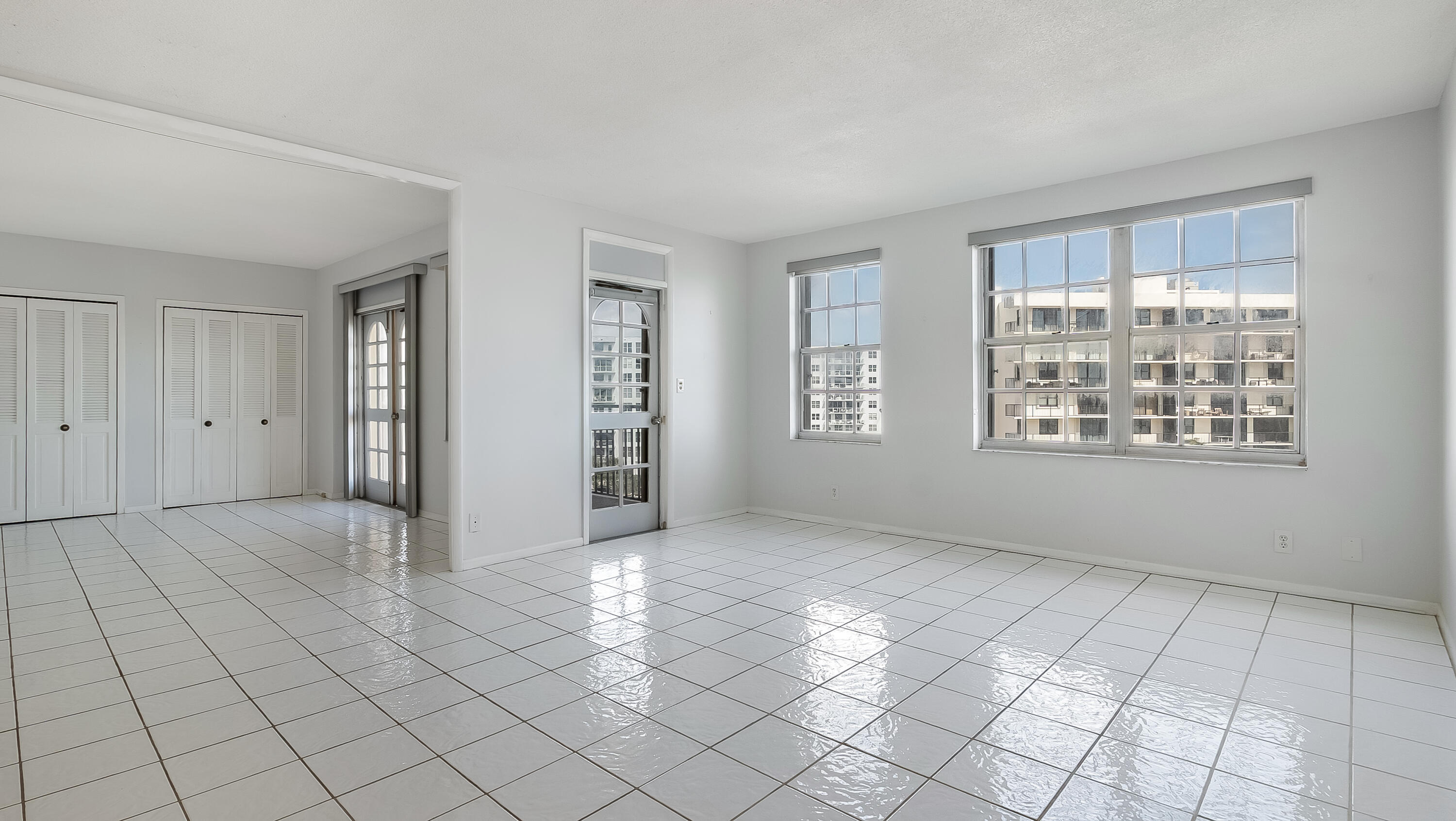 3475 South Ocean Boulevard, Unit 5140 Palm Beach, FL 33480 - Photo 19 of 55 an empty room with windows