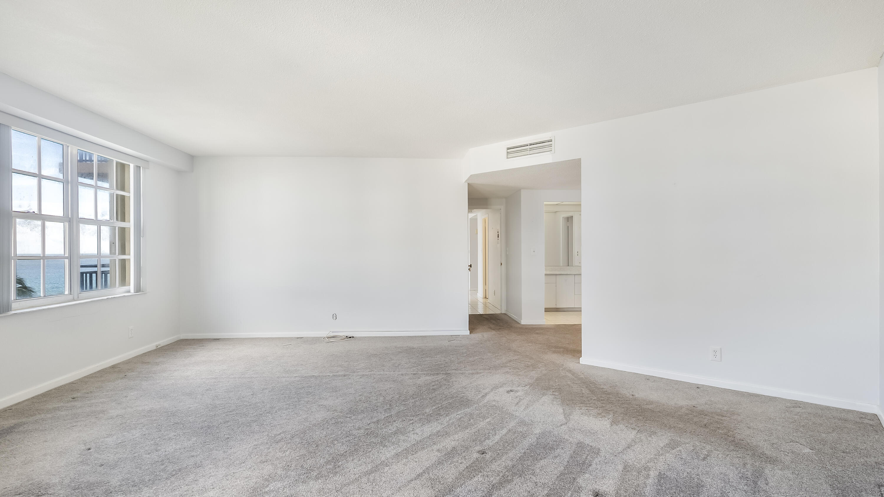 3475 South Ocean Boulevard, Unit 5140 Palm Beach, FL 33480 - Photo 35 of 55 a view of an empty room with a window