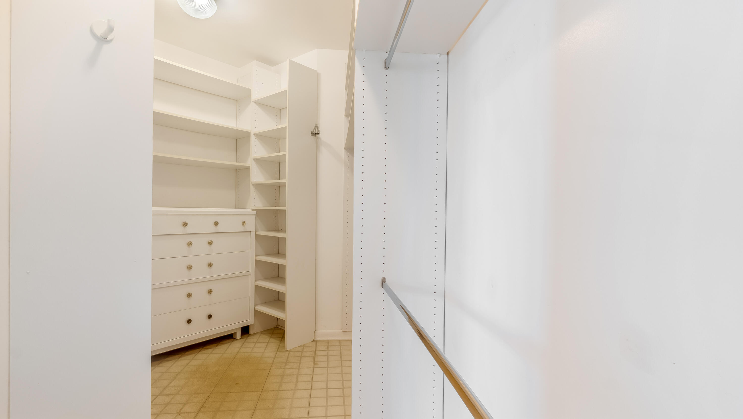 3475 South Ocean Boulevard, Unit 5140 Palm Beach, FL 33480 - Photo 46 of 55 a view of walk in closet with empty racks