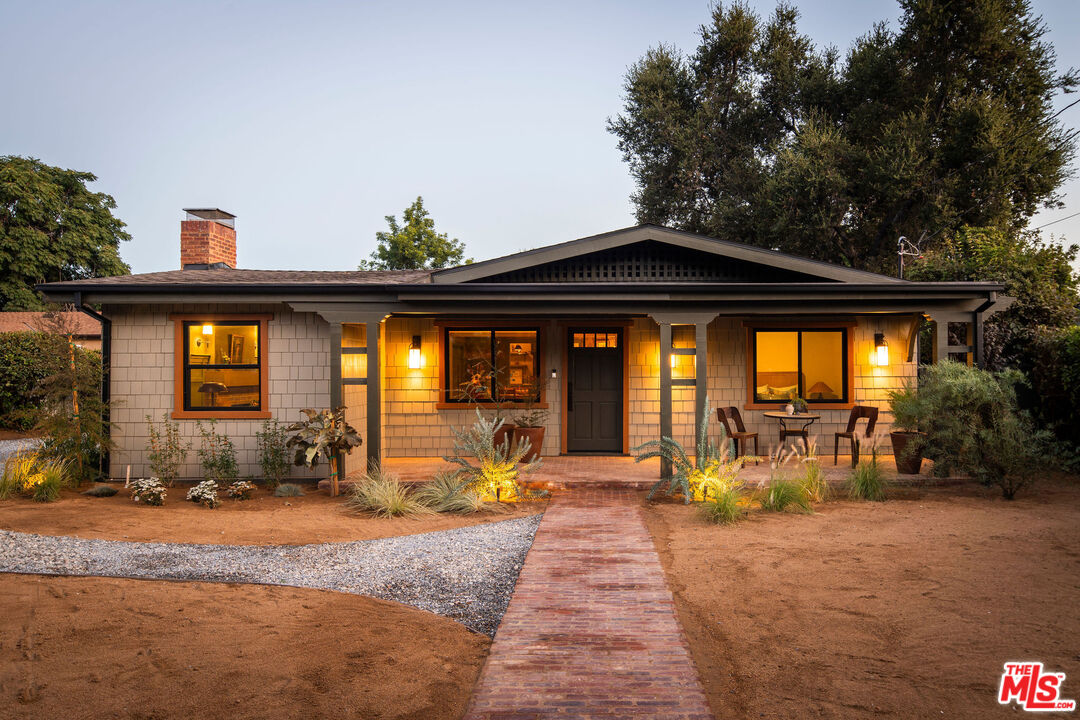 a front view of a house with patio