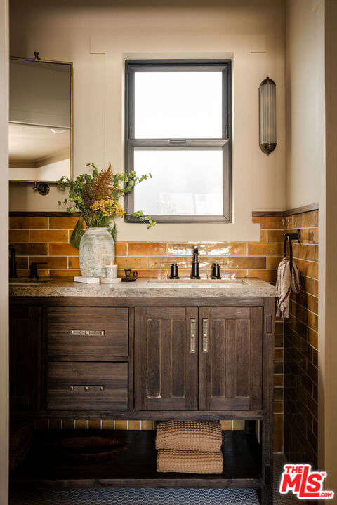 274 Acacia Street Altadena, CA 91001 - Photo 16 of 18 a bathroom with a sink and a mirror