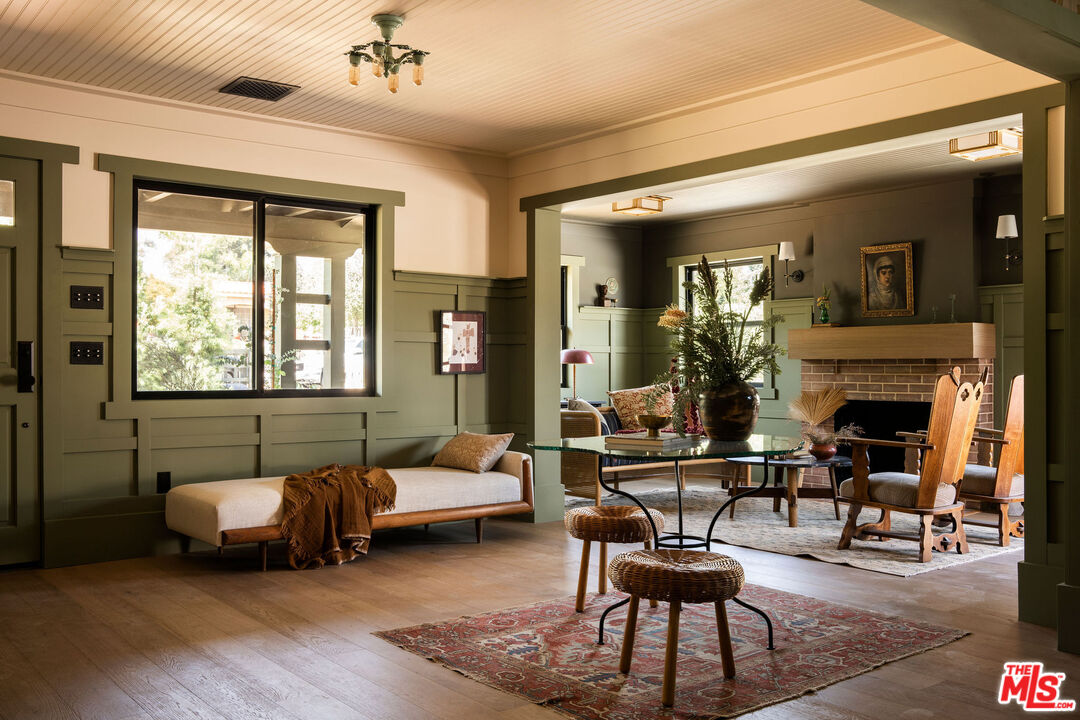 274 Acacia Street Altadena, CA 91001 - Photo 2 of 18 a living room with furniture and a fireplace