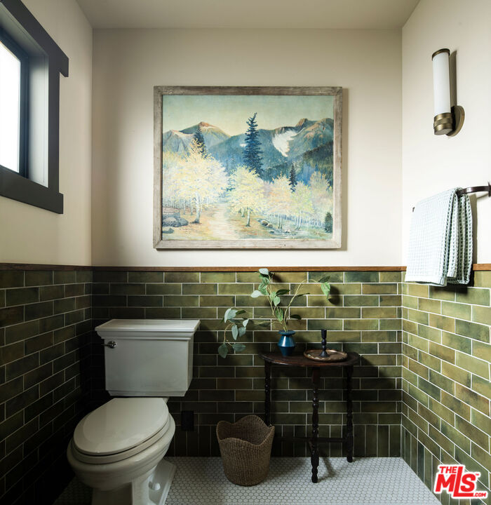 274 Acacia Street Altadena, CA 91001 - Photo 9 of 18 a bathroom with a toilet and a shower