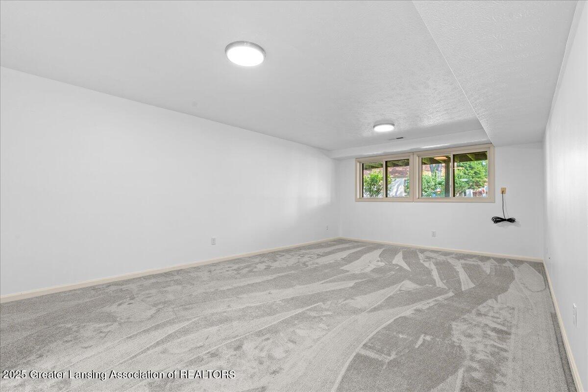 6526 Spring Tree Lane, Unit 30 Lansing, MI 48917 - Photo 23 of 36 28-Media Jett - 28