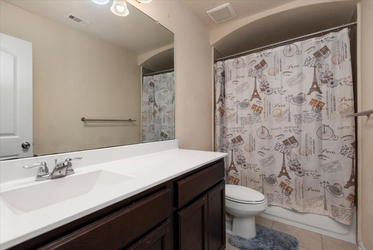 4606 Clara Rose Lane Katy, TX 77449 - Photo 16 of 25 a bathroom with a sink and a mirror