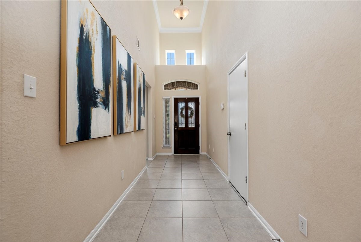 4606 Clara Rose Lane Katy, TX 77449 - Photo 2 of 25 a view of a hallway with entryway door with entryway