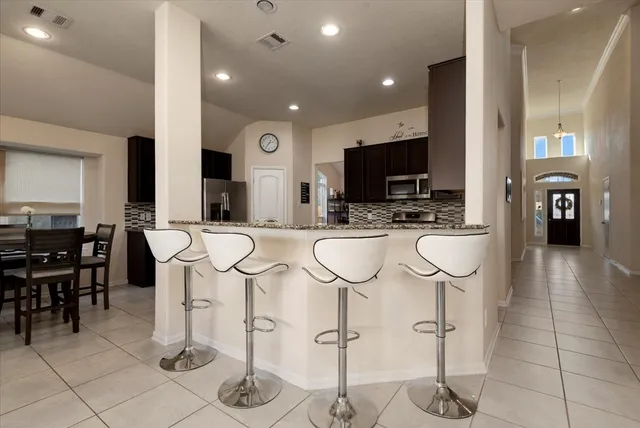 a view of a dining room with furniture