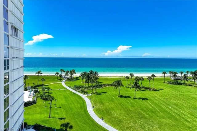 a sunset view with a swimming pool