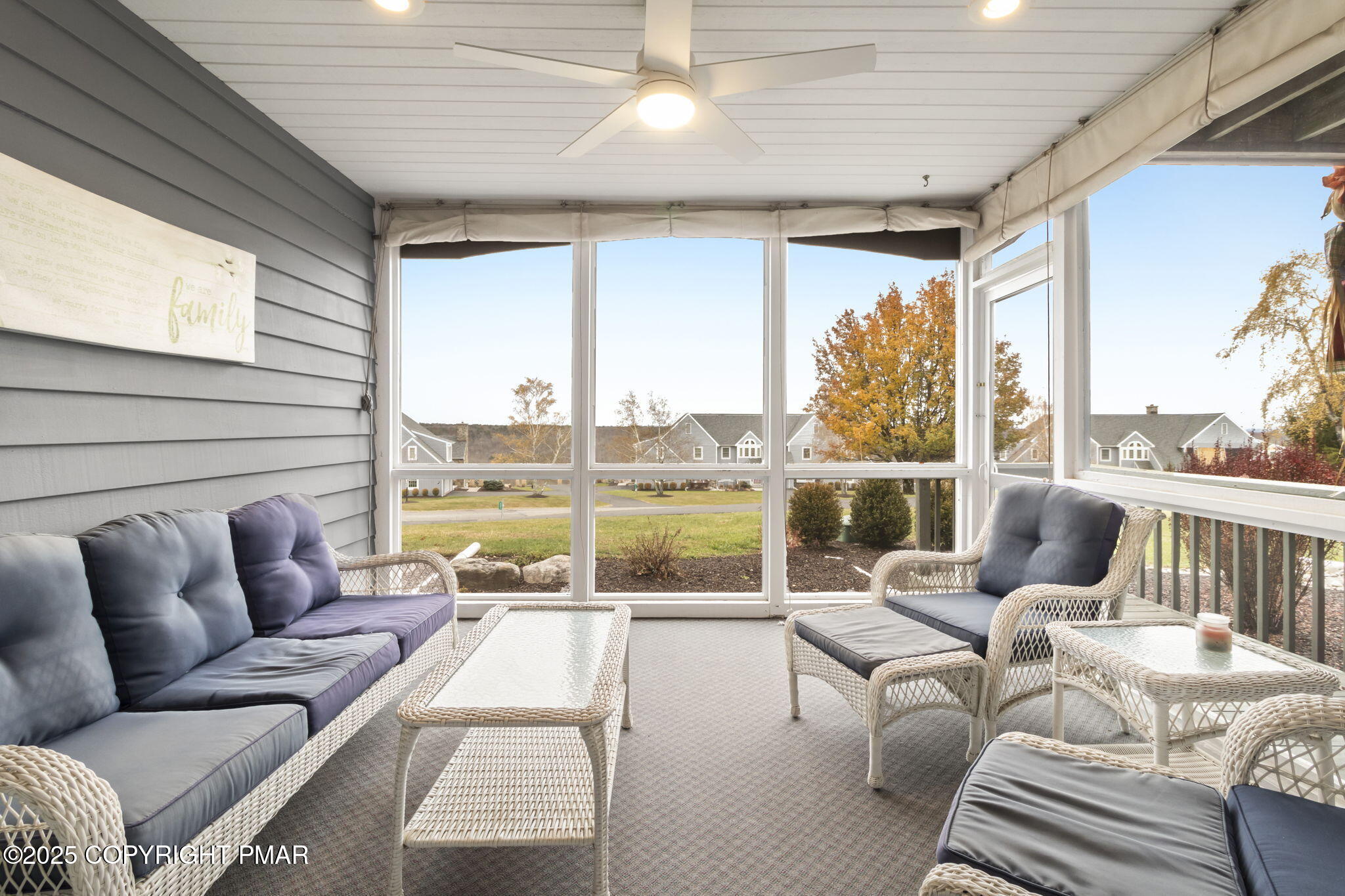 7317 Meadow Lane Canadensis, PA 18325 - Photo 15 of 25 a living room with furniture and floor to ceiling windows