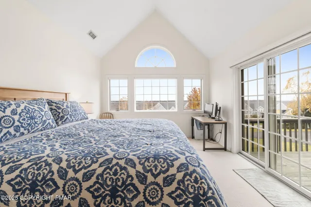 a view of a balcony with wooden floor
