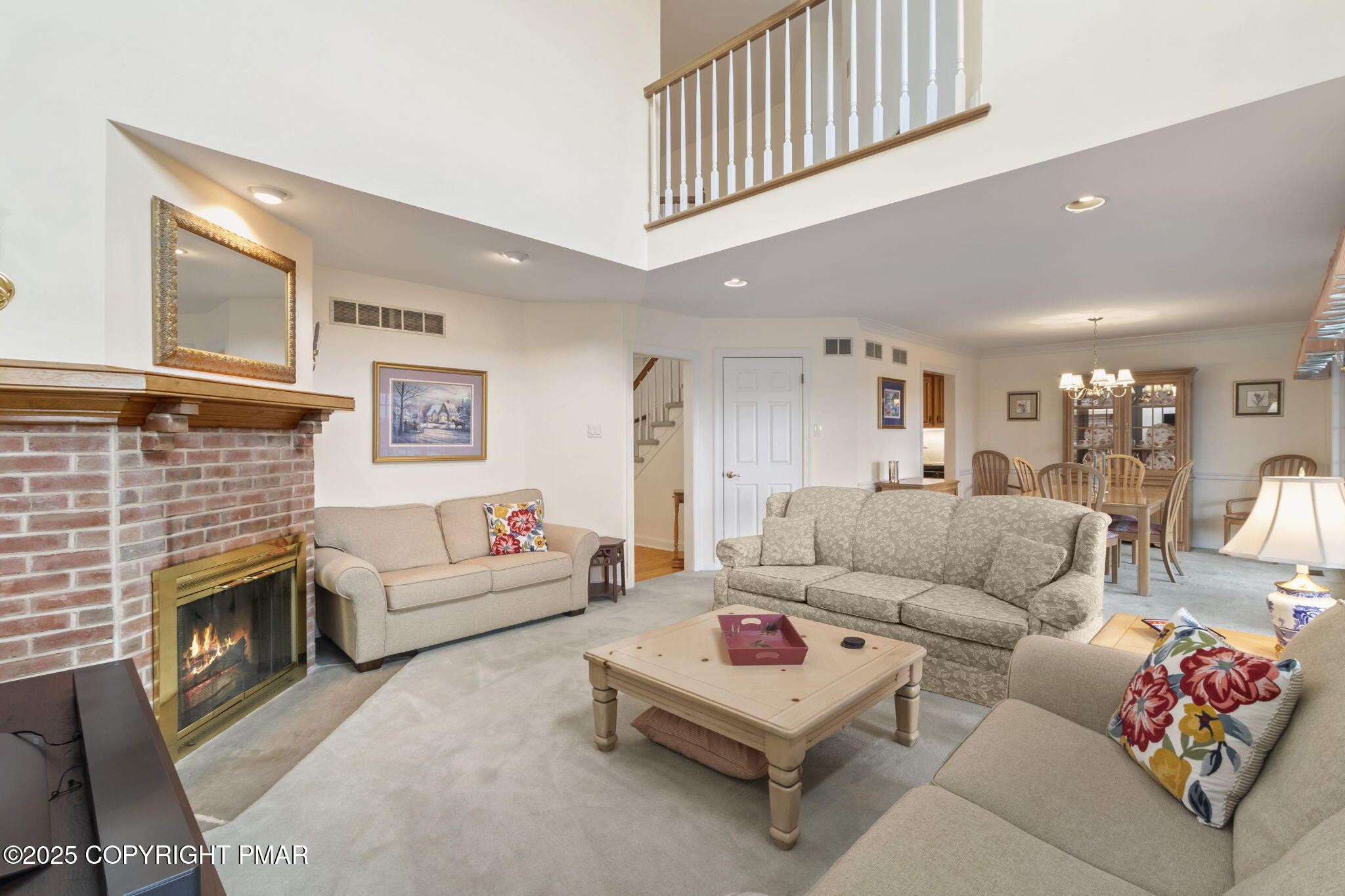 7317 Meadow Lane Canadensis, PA 18325 - Photo 8 of 25 a living room with furniture and a fireplace