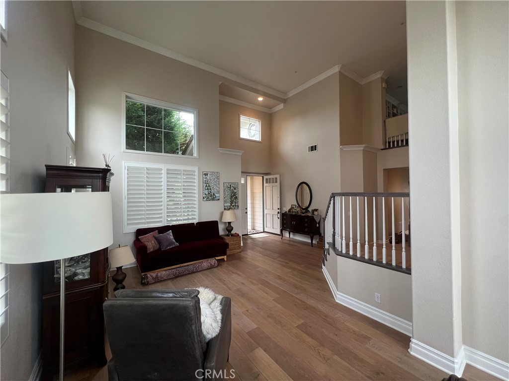 2420 Via Mero San Clemente, CA 92673 - Photo 6 of 7 a living room with furniture fireplace and flat screen tv