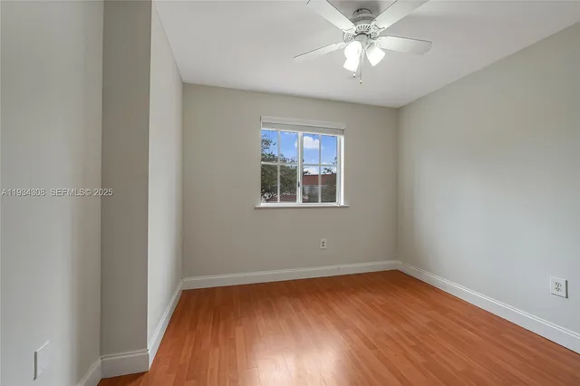 an aerial view of a houses with a lake view