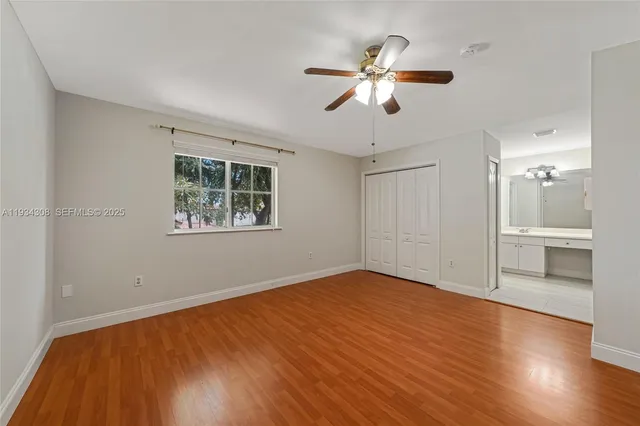 an aerial view of residential building and lake