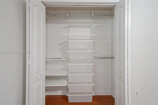 an aerial view of residential building with parking space