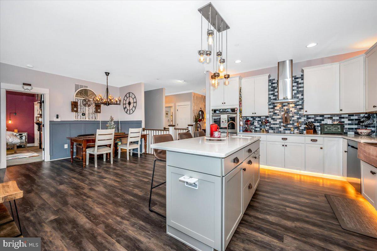 14231 Ridenour Road Smithsburg, MD 21783 - Photo 23 of 76 a kitchen that has a lot of cabinets in it