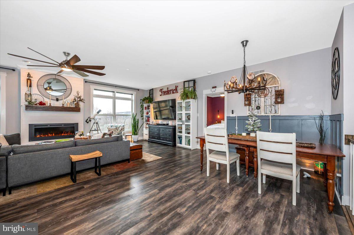 14231 Ridenour Road Smithsburg, MD 21783 - Photo 26 of 76 a living room with furniture and a wooden floor