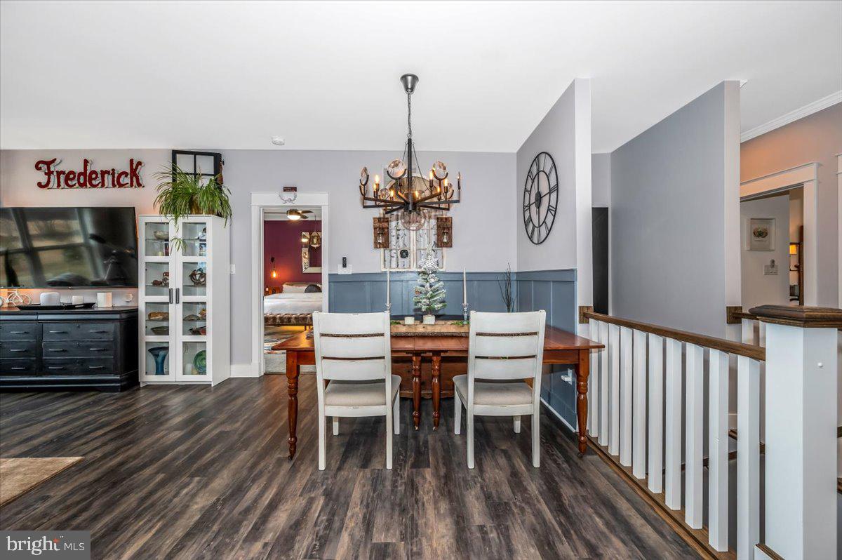14231 Ridenour Road Smithsburg, MD 21783 - Photo 27 of 76 a view of a dining room with furniture window and wooden floor