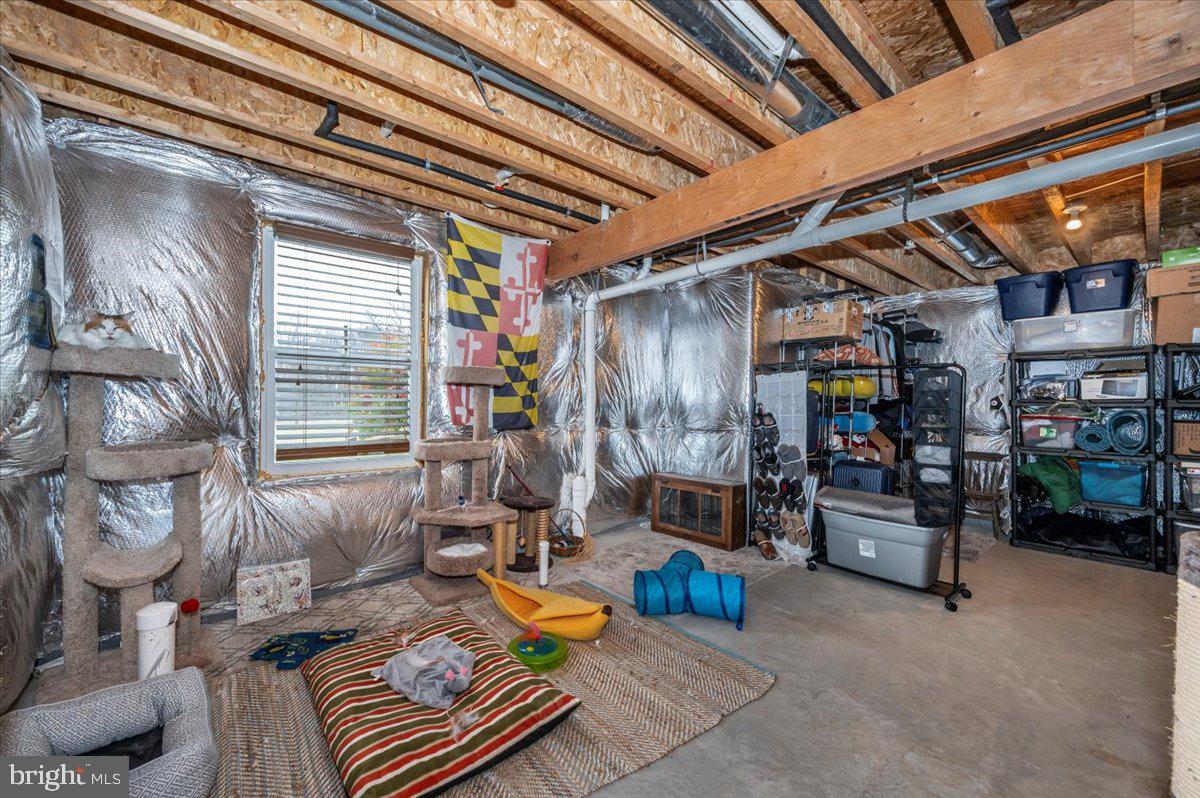 14231 Ridenour Road Smithsburg, MD 21783 - Photo 47 of 76 a living room with furniture and a window