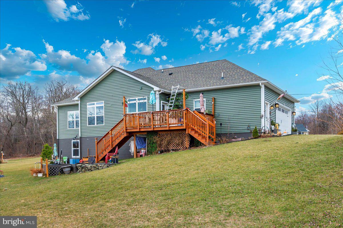 14231 Ridenour Road Smithsburg, MD 21783 - Photo 55 of 76 a view of a house with a yard porch and sitting area