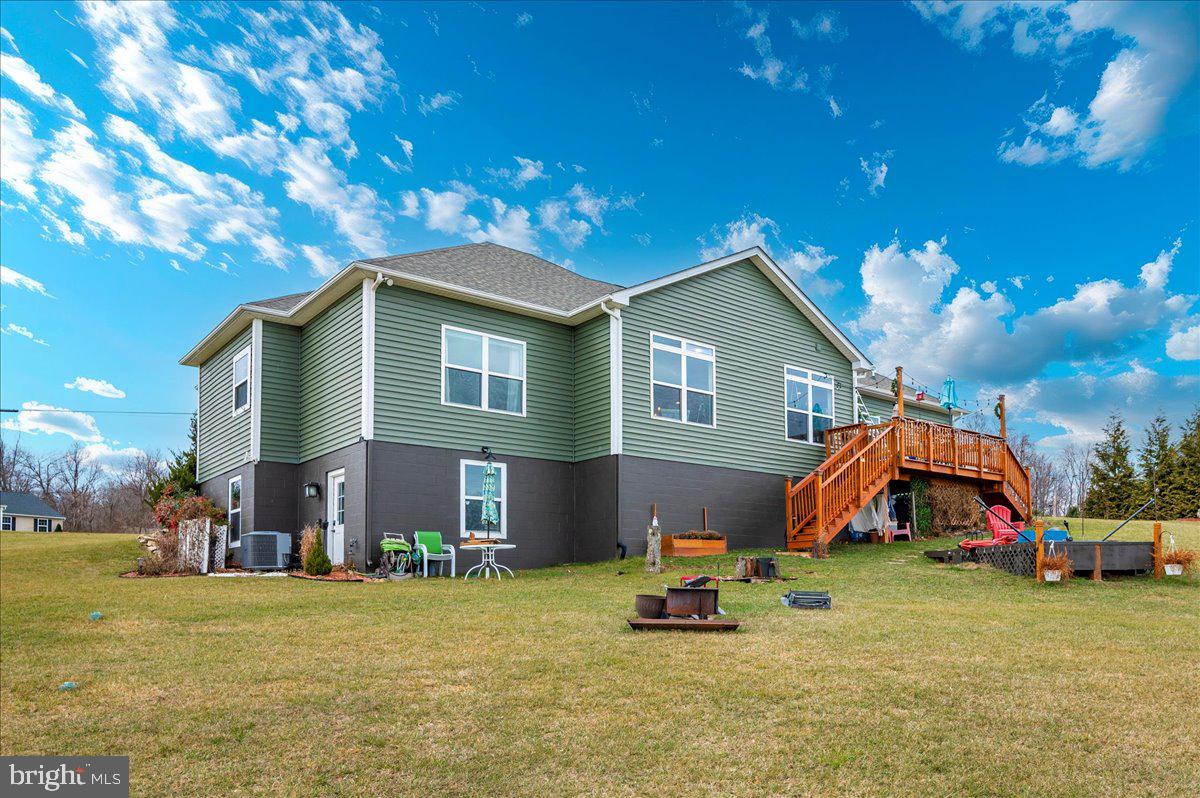 14231 Ridenour Road Smithsburg, MD 21783 - Photo 56 of 76 a view of a house with a yard and sitting area