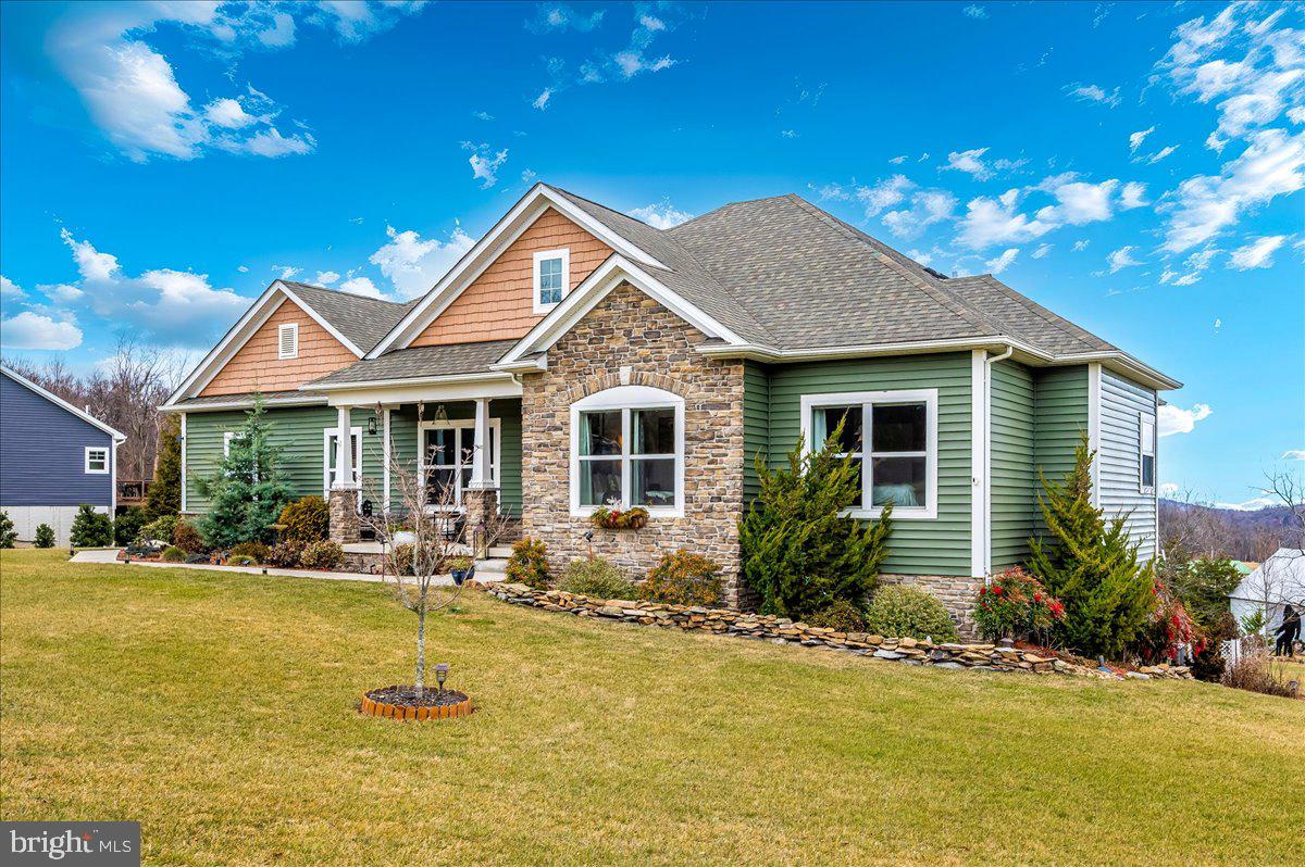14231 Ridenour Road Smithsburg, MD 21783 - Photo 69 of 76 a front view of house with swimming pool and porch with furniture
