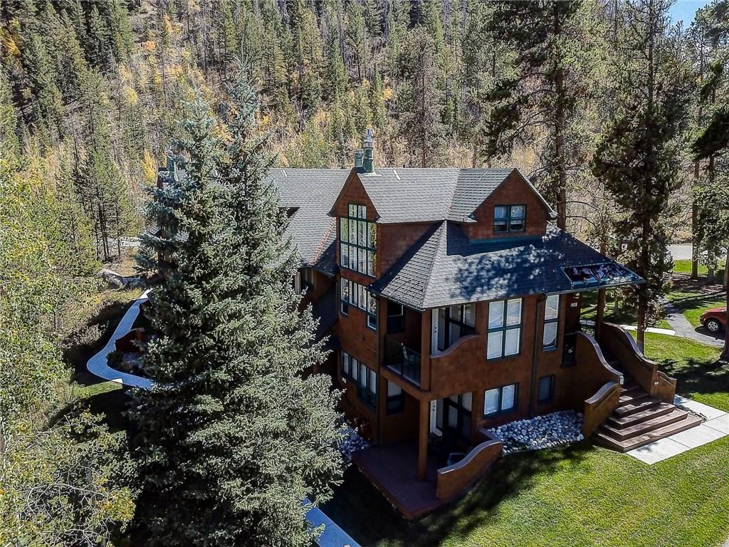 2027 Soda Ridge Road, Unit 1934 Keystone, CO 80435 - Photo 1 of 21 a view of a house with a yard